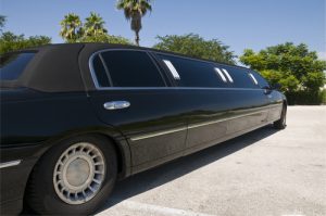 Black Stretch limousine waiting for guests to arrive